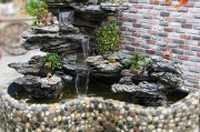 流水假山制作视频(假山怎么制作长流水)